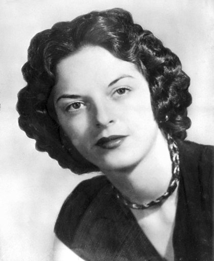 (AP Photo/Gene Herrick, File). FILE - In this 1955 file photo, Carolyn Bryant poses for a photo. A Justice Department report to Congress says the agency is reinvestigating the 1955 slaying of Emmett Till, a black teenager whose brutal killing in Missis... (AP Photo/Gene Herrick, File). FILE - In this 1955 file photo, Carolyn Bryant poses for a photo. A Justice Department report to Congress says the agency is reinvestigating the 1955 slaying of Emmett Till, a black teenager whose brutal killing in Missis...