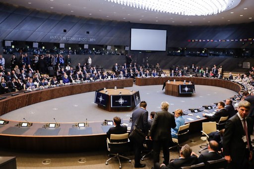 (AP Photo/Markus Schreiber). Heads of state and government with their delegations attend a working session during a summit at the NATO headquarters in Brussels on Wednesday, July 11, 2018. (AP Photo/Markus Schreiber). Heads of state and government with their delegations attend a working session during a summit at the NATO headquarters in Brussels on Wednesday, July 11, 2018.