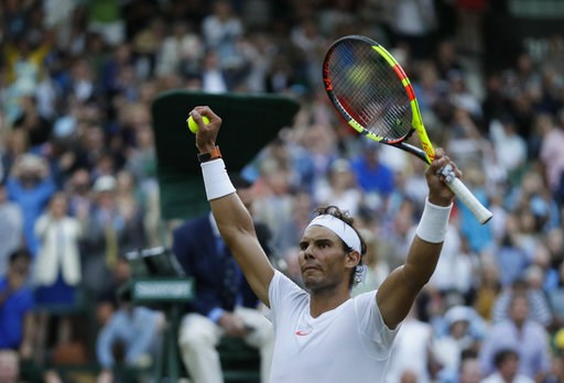 (AP Photo/Kirsty Wigglesworth). Rafael Nadal of Spain celebrates defeating Juan Martin Del Potro of Argentina in their men's quarterfinal match at the Wimbledon Tennis Championships in London, Wednesday July 11, 2018. (AP Photo/Kirsty Wigglesworth). Rafael Nadal of Spain celebrates defeating Juan Martin Del Potro of Argentina in their men's quarterfinal match at the Wimbledon Tennis Championships in London, Wednesday July 11, 2018.