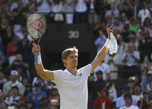 (AP Photo/Ben Curtis). Kevin Anderson of South Africa celebrates winning his men's quarterfinals match against Switzerland's Roger Federer, at the Wimbledon Tennis Championships, in London, Wednesday July 11, 2018. (AP Photo/Ben Curtis). Kevin Anderson of South Africa celebrates winning his men's quarterfinals match against Switzerland's Roger Federer, at the Wimbledon Tennis Championships, in London, Wednesday July 11, 2018.