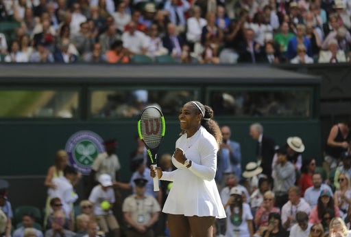 (AP Photo/Ben Curtis). Serena Williams of the United States celebrates winning her women's singles quarterfinals match against Italy's Camila Giorgi, at the Wimbledon Tennis Championships, in London, Tuesday July 10, 2018. (AP Photo/Ben Curtis). Serena Williams of the United States celebrates winning her women's singles quarterfinals match against Italy's Camila Giorgi, at the Wimbledon Tennis Championships, in London, Tuesday July 10, 2018.