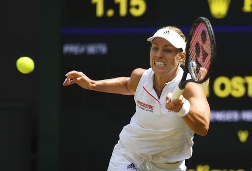 (Neil Hall/Pool via AP). Angelique Kerber of Germany returns the ball to Jelena Ostapenko of Latvia during their women's semifinal match at the Wimbledon Tennis Championships in London, Thursday July 12, 2018. (Neil Hall/Pool via AP). Angelique Kerber of Germany returns the ball to Jelena Ostapenko of Latvia during their women's semifinal match at the Wimbledon Tennis Championships in London, Thursday July 12, 2018.