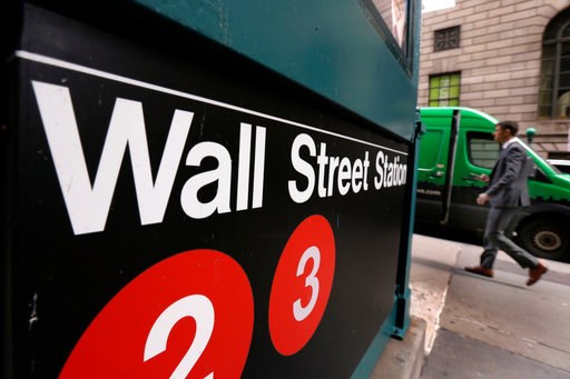 (AP Photo/Richard Drew, File). FILE- In this April 5, 2018, file photo, a sign for a Wall Street subway station is shown in New York. The U.S. stock market opens at 9:30 a.m. EDT on Thursday, July 12. (AP Photo/Richard Drew, File). FILE- In this April 5, 2018, file photo, a sign for a Wall Street subway station is shown in New York. The U.S. stock market opens at 9:30 a.m. EDT on Thursday, July 12.