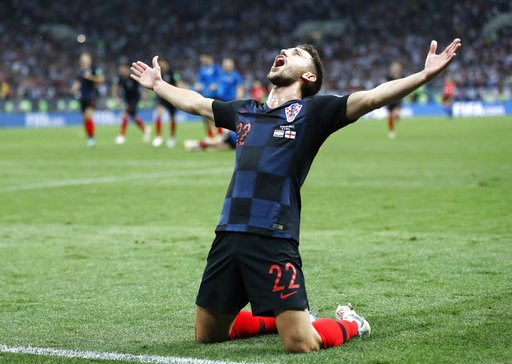 (AP Photo/Frank Augstein). Croatia's Josip Pivaric celebrates after his team advanced to the final during the semifinal match between Croatia and England at the 2018 soccer World Cup in the Luzhniki Stadium in Moscow, Russia, Wednesday, July 11, 2018. (AP Photo/Frank Augstein). Croatia's Josip Pivaric celebrates after his team advanced to the final during the semifinal match between Croatia and England at the 2018 soccer World Cup in the Luzhniki Stadium in Moscow, Russia, Wednesday, July 11, 2018.