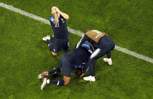 (AP Photo/Dmitri Lovetsky). France players celebrate their victory after the the semifinal match between France and Belgium at the 2018 soccer World Cup in the St. Petersburg Stadium in St. Petersburg, Russia, Tuesday, July 10, 2018. (AP Photo/Dmitri Lovetsky). France players celebrate their victory after the the semifinal match between France and Belgium at the 2018 soccer World Cup in the St. Petersburg Stadium in St. Petersburg, Russia, Tuesday, July 10, 2018.