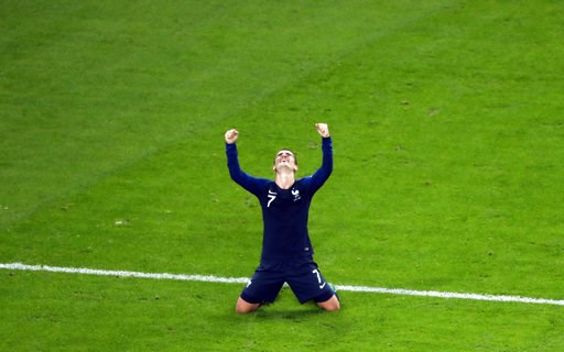 (AP Photo/Pavel Golovkin). France's Antoine Griezmann celebrates at the end of the semifinal match between France and Belgium at the 2018 soccer World Cup in the St. Petersburg Stadium in St. Petersburg, Russia, Tuesday, July 10, 2018. (AP Photo/Pavel Golovkin). France's Antoine Griezmann celebrates at the end of the semifinal match between France and Belgium at the 2018 soccer World Cup in the St. Petersburg Stadium in St. Petersburg, Russia, Tuesday, July 10, 2018.
