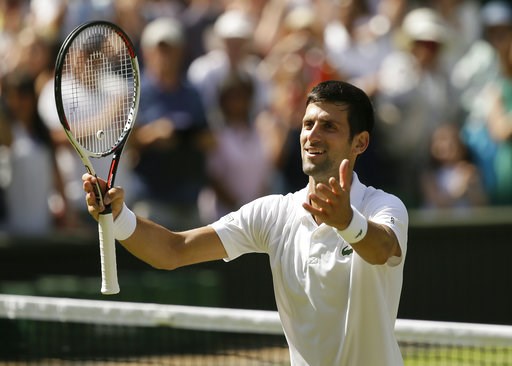 (AP Photo/Tim Ireland). Novak Djokovic of Serbia celebrates defeating Kei Nishikori of Japan during their men's quarterfinal match at the Wimbledon Tennis Championships in London, Wednesday July 11, 2018. (AP Photo/Tim Ireland). Novak Djokovic of Serbia celebrates defeating Kei Nishikori of Japan during their men's quarterfinal match at the Wimbledon Tennis Championships in London, Wednesday July 11, 2018.