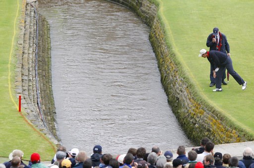 (AP Photo/Phil Noble, Pool). FILE - In this July 22, 2007, file photo, Ireland's Padraig Harrington looks down to where his ball landed in the Barry Burn during the final round of the British Open Golf Championship at Carnoustie, Scotland. Carnoustie i... (AP Photo/Phil Noble, Pool). FILE - In this July 22, 2007, file photo, Ireland's Padraig Harrington looks down to where his ball landed in the Barry Burn during the final round of the British Open Golf Championship at Carnoustie, Scotland. Carnoustie i...