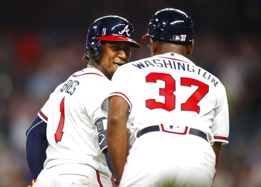 (AP Photo/Todd Kirkland). Atlanta Braves' Ozzie Albies (1) rounds third and shakes hands with third base coach Ron Washington (37) after hitting a solo home run during the sixth inning of a baseball game against the Toronto Blue Jays, Wednesday, July 1... (AP Photo/Todd Kirkland). Atlanta Braves' Ozzie Albies (1) rounds third and shakes hands with third base coach Ron Washington (37) after hitting a solo home run during the sixth inning of a baseball game against the Toronto Blue Jays, Wednesday, July 1...