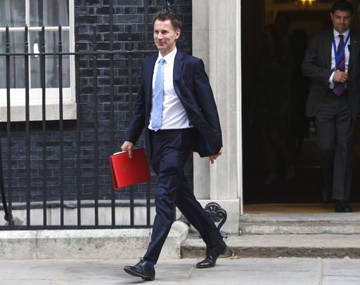 (Stefan Rousseau/PA via AP). Newly appointed Foreign Secretary, Jeremy Hunt, leaves Downing Street, following a cabinet meeting, in London, Tuesday July 10, 2018. British Prime Minister Theresa May has met with her Cabinet as she tries to restore gover... (Stefan Rousseau/PA via AP). Newly appointed Foreign Secretary, Jeremy Hunt, leaves Downing Street, following a cabinet meeting, in London, Tuesday July 10, 2018. British Prime Minister Theresa May has met with her Cabinet as she tries to restore gover...
