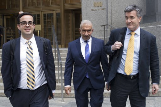 (AP Photo/Mary Altaffer). Alain Kaloyeros, center, a former president of the State University of New York's Polytechnic Institute, leaves Federal court where he is on trial on corruption charges, Wednesday, July 11, 2018, in New York. The case involves... (AP Photo/Mary Altaffer). Alain Kaloyeros, center, a former president of the State University of New York's Polytechnic Institute, leaves Federal court where he is on trial on corruption charges, Wednesday, July 11, 2018, in New York. The case involves...