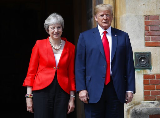 (AP Photo/Pablo Martinez Monsivais). U.S. President Donald Trump with British Prime Minister Theresa May pose for photographers at Chequers, in Buckinghamshire, England, Friday, July 13, 2018. (AP Photo/Pablo Martinez Monsivais). U.S. President Donald Trump with British Prime Minister Theresa May pose for photographers at Chequers, in Buckinghamshire, England, Friday, July 13, 2018.