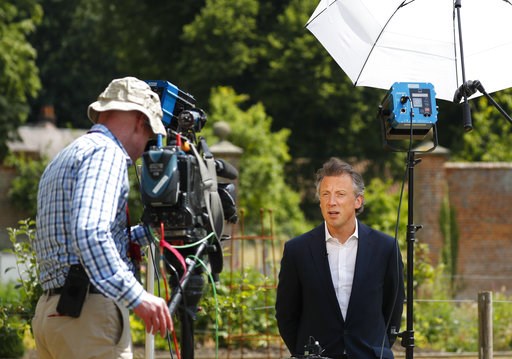 (AP Photo/Pablo Martinez Monsivais). Tom Newton Dunn, Political Editor of the Sun Newspaper, right, is seen speaking to Fox Television News network at Chequers, in Buckinghamshire, England, Friday, July 13, 2018. In an interview with Sun newspaper, Pre... (AP Photo/Pablo Martinez Monsivais). Tom Newton Dunn, Political Editor of the Sun Newspaper, right, is seen speaking to Fox Television News network at Chequers, in Buckinghamshire, England, Friday, July 13, 2018. In an interview with Sun newspaper, Pre...
