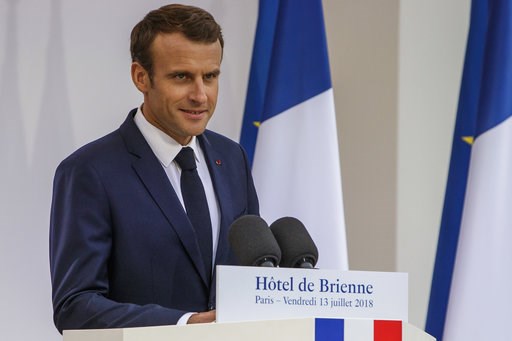 (Christophe Petit Tesson/Pool Photo via AP). rance's President Emmanuel Macron delivers a speech after signing the armed forces annual law budget, at the Hotel de Brienne, in Paris, France, Friday, July 13, 2018. . (Christophe Petit Tesson/Pool Photo via AP). rance's President Emmanuel Macron delivers a speech after signing the armed forces annual law budget, at the Hotel de Brienne, in Paris, France, Friday, July 13, 2018. .