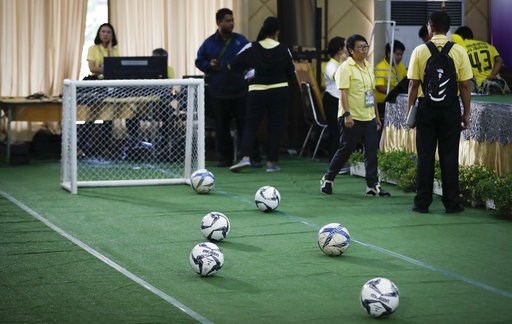 The Latest: Thai youth soccer team meets with the media