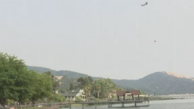 Battling 18 blazes, California may face worst fire season