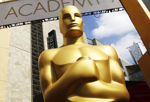 (Photo by Matt Sayles/Invision/AP, File). FILE - In this Feb. 21, 2015 file photo, an Oscar statue appears outside the Dolby Theatre for the 87th Academy Awards in Los Angeles. The Oscars are adding a new category to honor popular films and promising a... (Photo by Matt Sayles/Invision/AP, File). FILE - In this Feb. 21, 2015 file photo, an Oscar statue appears outside the Dolby Theatre for the 87th Academy Awards in Los Angeles. The Oscars are adding a new category to honor popular films and promising a...