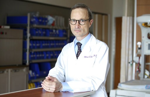 (AP Photo/Teresa Crawford). In this Aug. 7, 2018 photo, Dr. William Grobman stands for a portrait at Prentice Women's Hospital/Northwestern Medicine in Chicago. Having an induced pregnancy doesn't mean moms can't have "natural childbirth" _ they can fo... (AP Photo/Teresa Crawford). In this Aug. 7, 2018 photo, Dr. William Grobman stands for a portrait at Prentice Women's Hospital/Northwestern Medicine in Chicago. Having an induced pregnancy doesn't mean moms can't have "natural childbirth" _ they can fo...