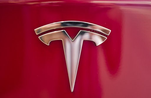 (AP Photo/Richard Vogel). A Tesla emblem is seen on the back end of a Model S in the Tesla showroom in Santa Monica, Calif., on Wednesday, Aug. 8, 2018. Board members at Tesla are evaluating CEO and Chairman Elon Musk's $72 billion proposal to take the... (AP Photo/Richard Vogel). A Tesla emblem is seen on the back end of a Model S in the Tesla showroom in Santa Monica, Calif., on Wednesday, Aug. 8, 2018. Board members at Tesla are evaluating CEO and Chairman Elon Musk's $72 billion proposal to take the...