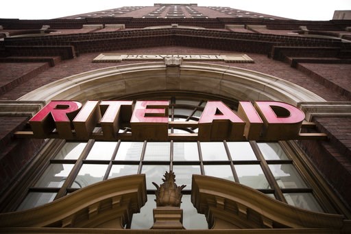 (AP Photo/Matt Rourke, File). FILE- This Oct. 21, 2016, file photo shows a Rite Aid location in Philadelphia. Rite Aid chopped its full-year profit forecast three days before its shareholders vote on a bid by the grocer Albertsons Companies to buy the ... (AP Photo/Matt Rourke, File). FILE- This Oct. 21, 2016, file photo shows a Rite Aid location in Philadelphia. Rite Aid chopped its full-year profit forecast three days before its shareholders vote on a bid by the grocer Albertsons Companies to buy the ...