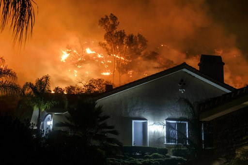 (AP Photo/Ringo H.W. Chiu). The Holy Fire burns in the Cleveland National Forest at a hillside near homes in Lake Elsinore, Calif., Thursday, Aug. 9, 2018. (AP Photo/Ringo H.W. Chiu). The Holy Fire burns in the Cleveland National Forest at a hillside near homes in Lake Elsinore, Calif., Thursday, Aug. 9, 2018.