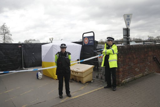 (AP Photo/Matt Dunham, File). FILE - In this March 13, 2018, file photo, police officers guard a cordon around a police tent covering a supermarket car park pay machine near the spot where former Russian spy Sergei Skripal and his daughter were found c... (AP Photo/Matt Dunham, File). FILE - In this March 13, 2018, file photo, police officers guard a cordon around a police tent covering a supermarket car park pay machine near the spot where former Russian spy Sergei Skripal and his daughter were found c...