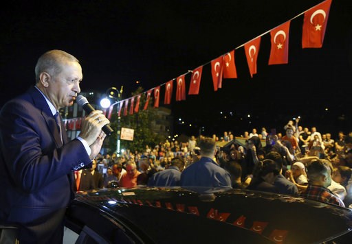 (Presidential Press Service via AP, Pool). Turkey's President Recep Tayyip Erdogan addresses supporters at his Black Sea hometown, Guneysu, Turkey, early Friday, Aug. 10, 2018. Turkey's Finance and Treasury Minister Berat Albayrak will reveal a " new e... (Presidential Press Service via AP, Pool). Turkey's President Recep Tayyip Erdogan addresses supporters at his Black Sea hometown, Guneysu, Turkey, early Friday, Aug. 10, 2018. Turkey's Finance and Treasury Minister Berat Albayrak will reveal a " new e...