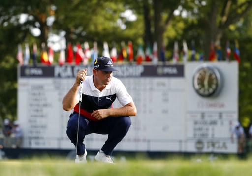(AP Photo/Jeff Roberson). Gary Woodland looks at a putt on the 18th green during the first round of the PGA Championship golf tournament at Bellerive Country Club, Thursday, Aug. 9, 2018, in St. Louis. (AP Photo/Jeff Roberson). Gary Woodland looks at a putt on the 18th green during the first round of the PGA Championship golf tournament at Bellerive Country Club, Thursday, Aug. 9, 2018, in St. Louis.