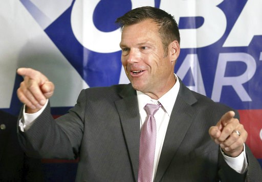 (Thad Allton /The Topeka Capital-Journal via AP). Secretary of State Kris Kobach spoke to the media during a news conference at the Topeka Capitol Plaza hotel in Topeka, Kan., Wednesday, Aug. 8, 2018. (Thad Allton /The Topeka Capital-Journal via AP). Secretary of State Kris Kobach spoke to the media during a news conference at the Topeka Capitol Plaza hotel in Topeka, Kan., Wednesday, Aug. 8, 2018.