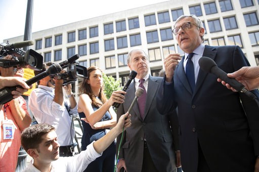(AP Photo/J. Scott Applewhite). Paul Kamenar, right, attorney for Andrew Miller, joined by Peter Flaherty, center, chairman of the National Legal and Policy Center, talks to reporters after a federal judge found Miller in contempt for refusing to testi... (AP Photo/J. Scott Applewhite). Paul Kamenar, right, attorney for Andrew Miller, joined by Peter Flaherty, center, chairman of the National Legal and Policy Center, talks to reporters after a federal judge found Miller in contempt for refusing to testi...