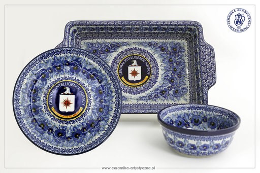 (Boleslawiec Artistic Handicrafts Cooperative via AP). In this undated photo made available on Friday, Aug. 10, 2018 by the Boleslawiec Artistic Handicrafts Cooperative, pieces of unique hand-painted pottery with the CIA logo recently made for the U.S... (Boleslawiec Artistic Handicrafts Cooperative via AP). In this undated photo made available on Friday, Aug. 10, 2018 by the Boleslawiec Artistic Handicrafts Cooperative, pieces of unique hand-painted pottery with the CIA logo recently made for the U.S...