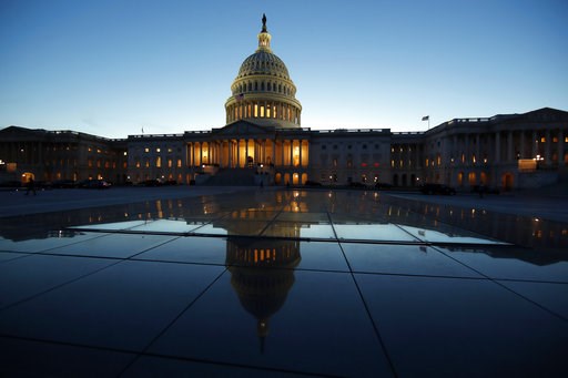 (AP Photo/Alex Brandon, File). FILE- This March 5, 2018, file photo show the East Front of the U.S. Capitol at sunset in Washington. On Friday, Aug. 10, the Treasury Department releases federal budget data for July. (AP Photo/Alex Brandon, File). FILE- This March 5, 2018, file photo show the East Front of the U.S. Capitol at sunset in Washington. On Friday, Aug. 10, the Treasury Department releases federal budget data for July.