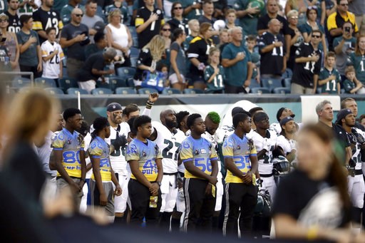 (AP Photo/Matt Rourke). Philadelphia Eagles' Malcolm Jenkins, center left, raises his fist during the national anthem before the team's preseason NFL football game against the Pittsburgh Steelers, Thursday, Aug. 9, 2018, in Philadelphia. (AP Photo/Matt Rourke). Philadelphia Eagles' Malcolm Jenkins, center left, raises his fist during the national anthem before the team's preseason NFL football game against the Pittsburgh Steelers, Thursday, Aug. 9, 2018, in Philadelphia.