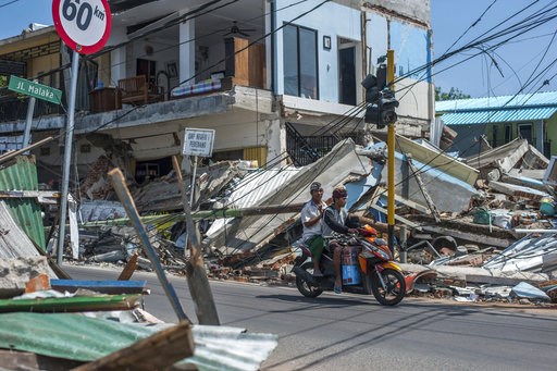 Lombok lifted 10 inches by quake that killed nearly 400