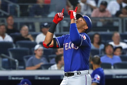 (AP Photo/Julie Jacobson). Texas Rangers' Ronald Guzman reacts as he crosses the plate after hitting a solo home run against the New York Yankees during the fourth inning of a baseball game Friday, Aug. 10, 2018, in New York. (AP Photo/Julie Jacobson). Texas Rangers' Ronald Guzman reacts as he crosses the plate after hitting a solo home run against the New York Yankees during the fourth inning of a baseball game Friday, Aug. 10, 2018, in New York.