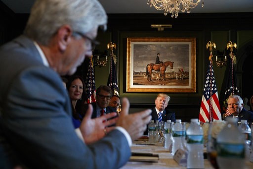 (AP Photo/Carolyn Kaster). President Donald Trump looks to Mississippi Gov. Phil Bryant, left, as he speaks during a meeting with state leaders about prison reform, Thursday, Aug. 9, 2018, at Trump National Golf Club in Bedminster, N.J. Also seated at ... (AP Photo/Carolyn Kaster). President Donald Trump looks to Mississippi Gov. Phil Bryant, left, as he speaks during a meeting with state leaders about prison reform, Thursday, Aug. 9, 2018, at Trump National Golf Club in Bedminster, N.J. Also seated at ...