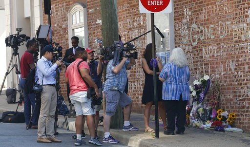(AP Photo/Steve Helber). Susan Bro, mother of Heather Heyer who was killed during last year's Unite the Right rally, speaks with reporters at the spot where her daughter was killed in Charlottesville, Va., Friday, Aug. 10, 2018. The governor has declar... (AP Photo/Steve Helber). Susan Bro, mother of Heather Heyer who was killed during last year's Unite the Right rally, speaks with reporters at the spot where her daughter was killed in Charlottesville, Va., Friday, Aug. 10, 2018. The governor has declar...