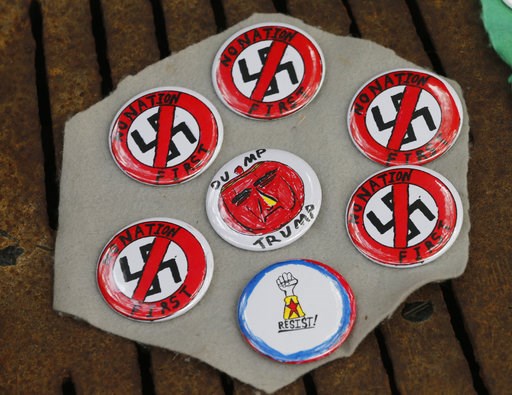 (AP Photo/Steve Helber). A vendor displays wares on the mall as State Police lock down the downtown area in anticipation of the anniversary of last year's Unite the Right rally in Charlottesville, Va., Saturday, Aug. 11, 2018. The Governor has declared... (AP Photo/Steve Helber). A vendor displays wares on the mall as State Police lock down the downtown area in anticipation of the anniversary of last year's Unite the Right rally in Charlottesville, Va., Saturday, Aug. 11, 2018. The Governor has declared...