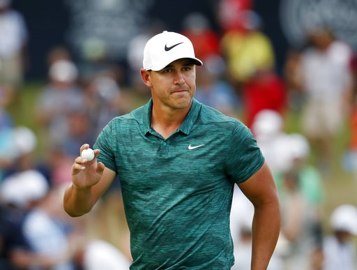 (AP Photo/Jeff Roberson). Brooks Koepka waves to the crowd after making his birdie putt on the 15th green during the final round of the PGA Championship golf tournament at Bellerive Country Club, Sunday, Aug. 12, 2018, in St. Louis. (AP Photo/Jeff Roberson). Brooks Koepka waves to the crowd after making his birdie putt on the 15th green during the final round of the PGA Championship golf tournament at Bellerive Country Club, Sunday, Aug. 12, 2018, in St. Louis.