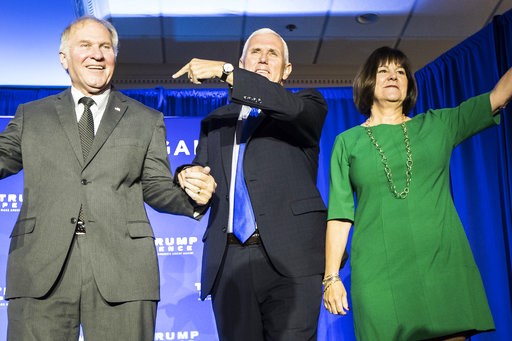 (AP Photo/John Minchillo, File). In this Oct. 17, 2018, file photo, from left, Rep. Steve Chabot, R-Ohio, left, Republican vice presidential candidate, Indiana Gov. Mike Pence, and Pence's wife Karen, wave to the crowd during a campaign rally, Monday, ... (AP Photo/John Minchillo, File). In this Oct. 17, 2018, file photo, from left, Rep. Steve Chabot, R-Ohio, left, Republican vice presidential candidate, Indiana Gov. Mike Pence, and Pence's wife Karen, wave to the crowd during a campaign rally, Monday, ...