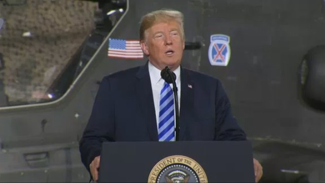 Trump signs bill named for Sen. McCain, doesn't mention him