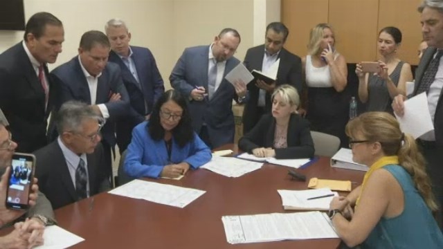 The Latest: Nelson lawyer blasts Gov. Scott for intervening