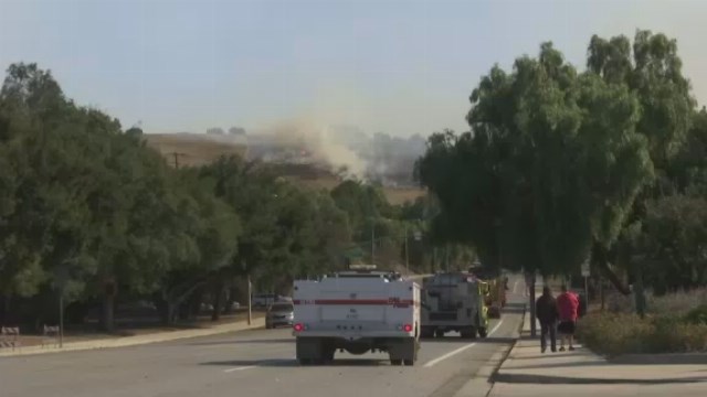 Fires besiege California city reeling from mass shooting