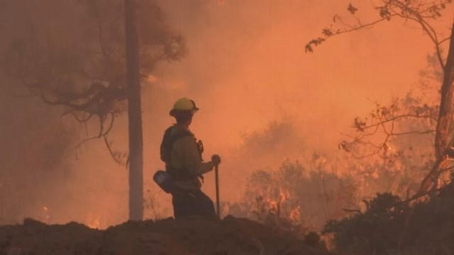 Holding out slim hope as crews search for more fire dead