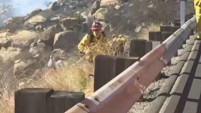 The Latest: Firefighters work to contain S. California fire