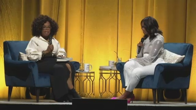 Michelle Obama begins arena tour in talk with Oprah