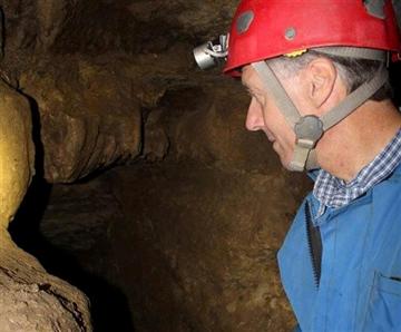 (AP Photo/Jeff Baenen). In this Oct. 10, 2013, photo, John Ackerman gives a closeup look at his Spring Valley Caverns near Spring Valley, Minn., looking back to the place where he plans to be buried when he dies. (AP Photo/Jeff Baenen). In this Oct. 10, 2013, photo, John Ackerman gives a closeup look at his Spring Valley Caverns near Spring Valley, Minn., looking back to the place where he plans to be buried when he dies.