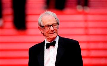 (AP Photo/Thibault Camus). Director Ken Loach leaves following the screening of Jimmy's Hall at the 67th international film festival, Cannes, southern France, Thursday, May 22, 2014.