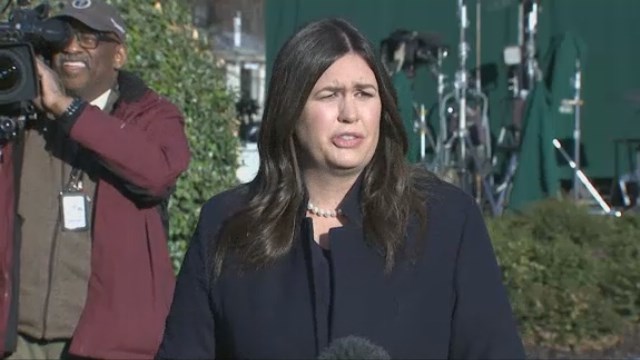 The Latest: Stone, shackled, arrives at federal courthouse