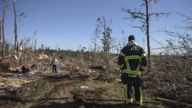 The Latest: Expert: Deadly tornado on big trek over 2 states